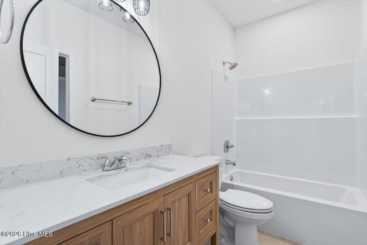 355 South Middleton Drive Northwest Calabash, NC 28467 - Photo 18 of 81 Enjoy designer-style bathrooms—fresh, bright, and built to impress.