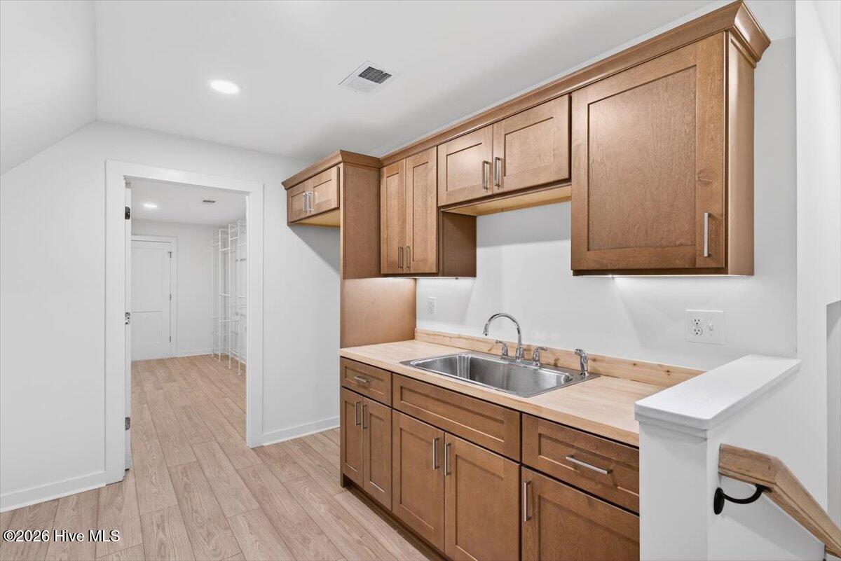 355 South Middleton Drive Northwest Calabash, NC 28467 - Photo 22 of 81 A rare bonus feature—upstairs kitchen space designed for comfort, flexibility, and hosting.