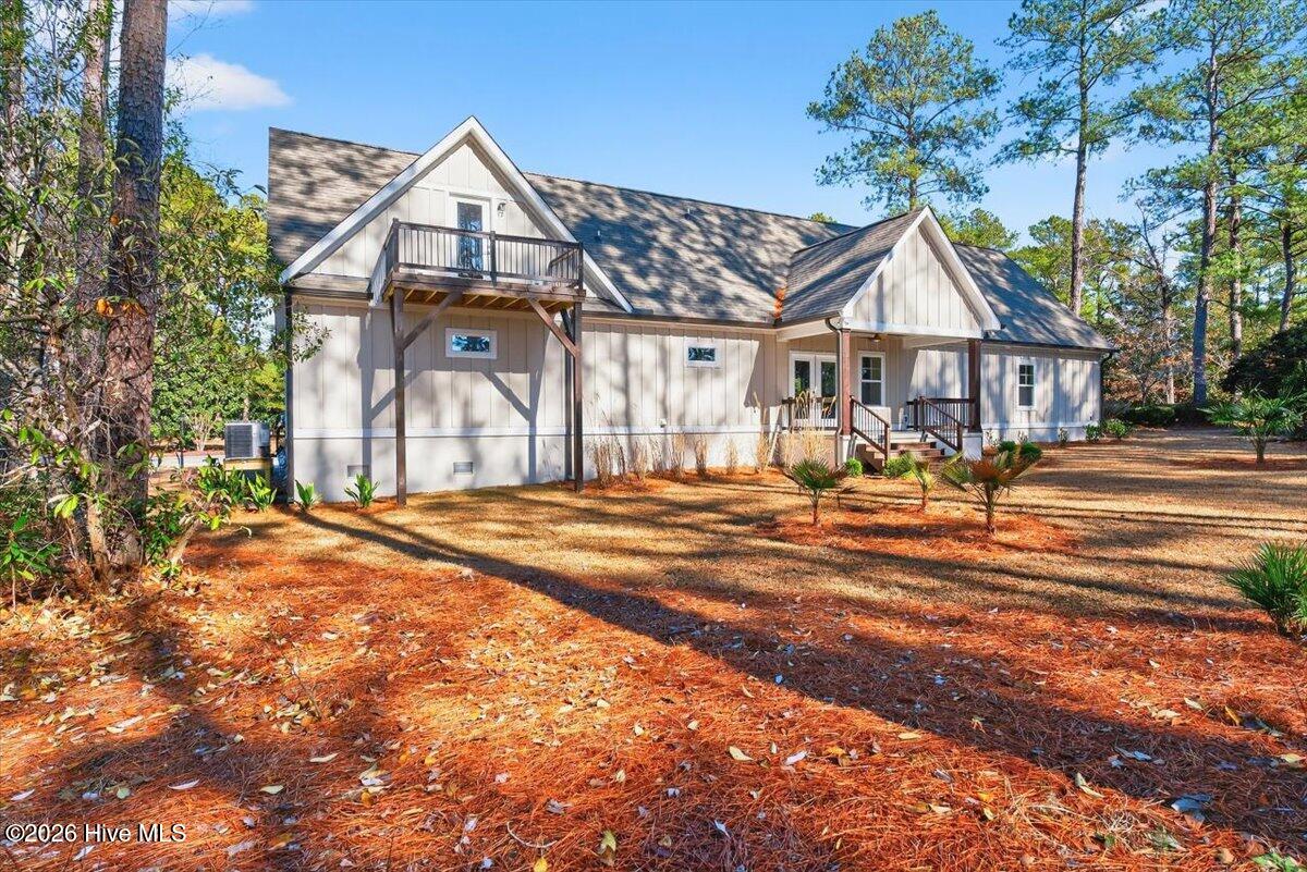 355 South Middleton Drive Northwest Calabash, NC 28467 - Photo 38 of 81 Stunning new build near Sunset Beach with privacy, presence, and golf course views in Brunswick County.