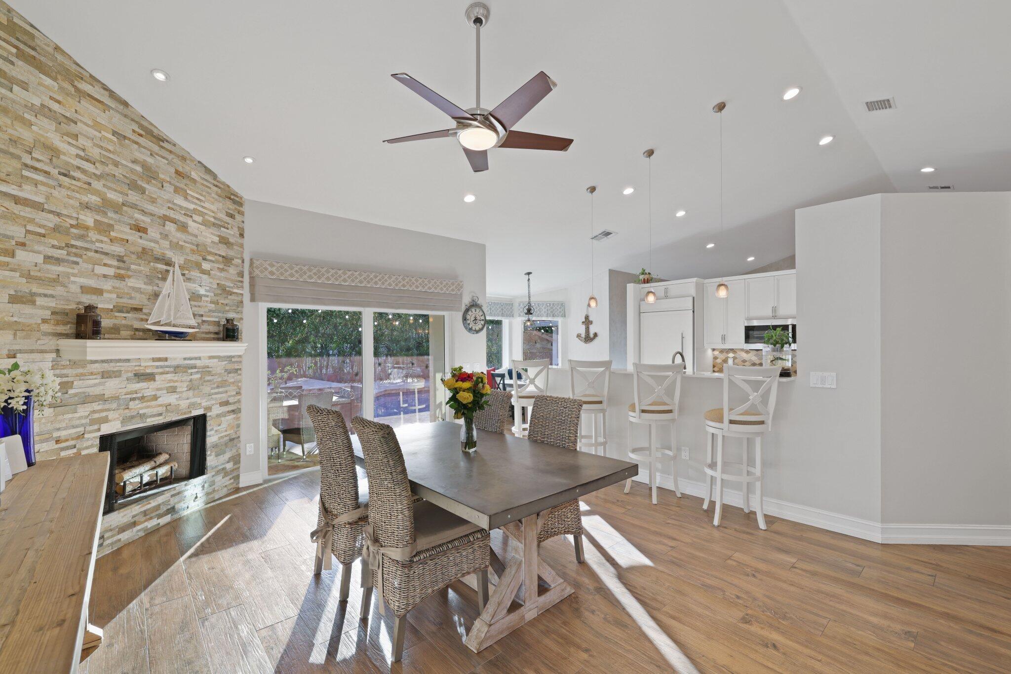 2225 Rabbit Hollowe Circle Delray Beach, FL 33445 - Photo 11 of 65 Family room to kitchen