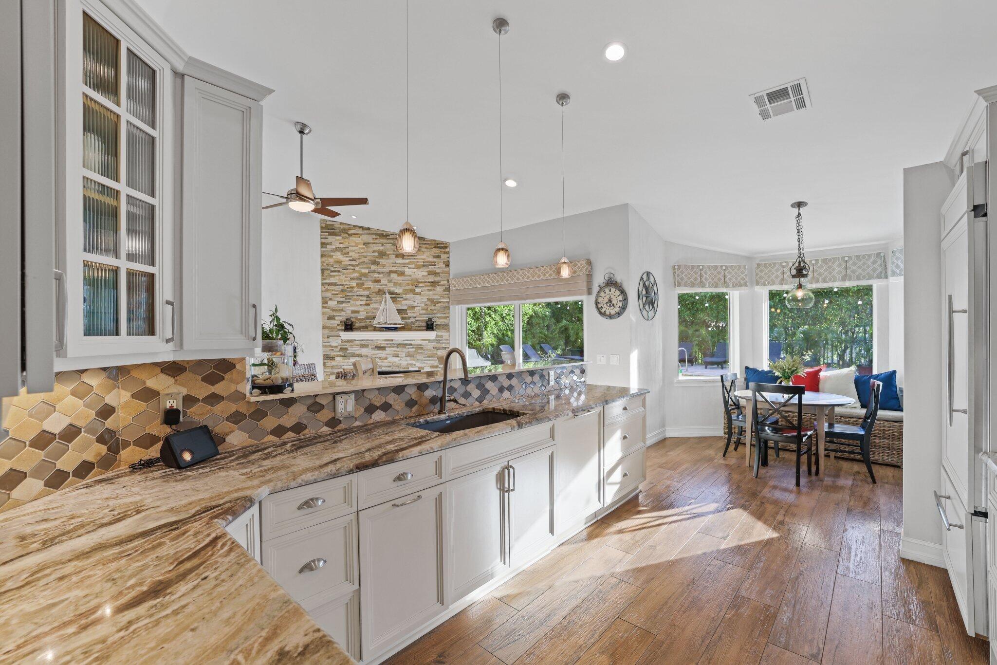 2225 Rabbit Hollowe Circle Delray Beach, FL 33445 - Photo 21 of 65 Kitchen to Breakfast Nook