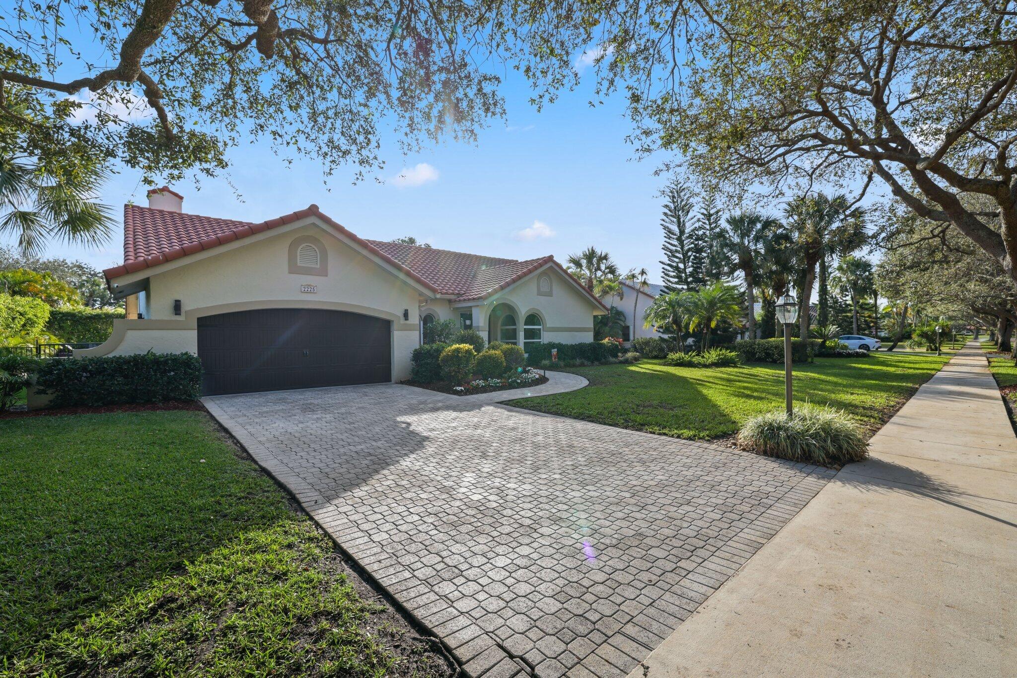 2225 Rabbit Hollowe Circle Delray Beach, FL 33445 - Photo 64 of 65 Exterior Front