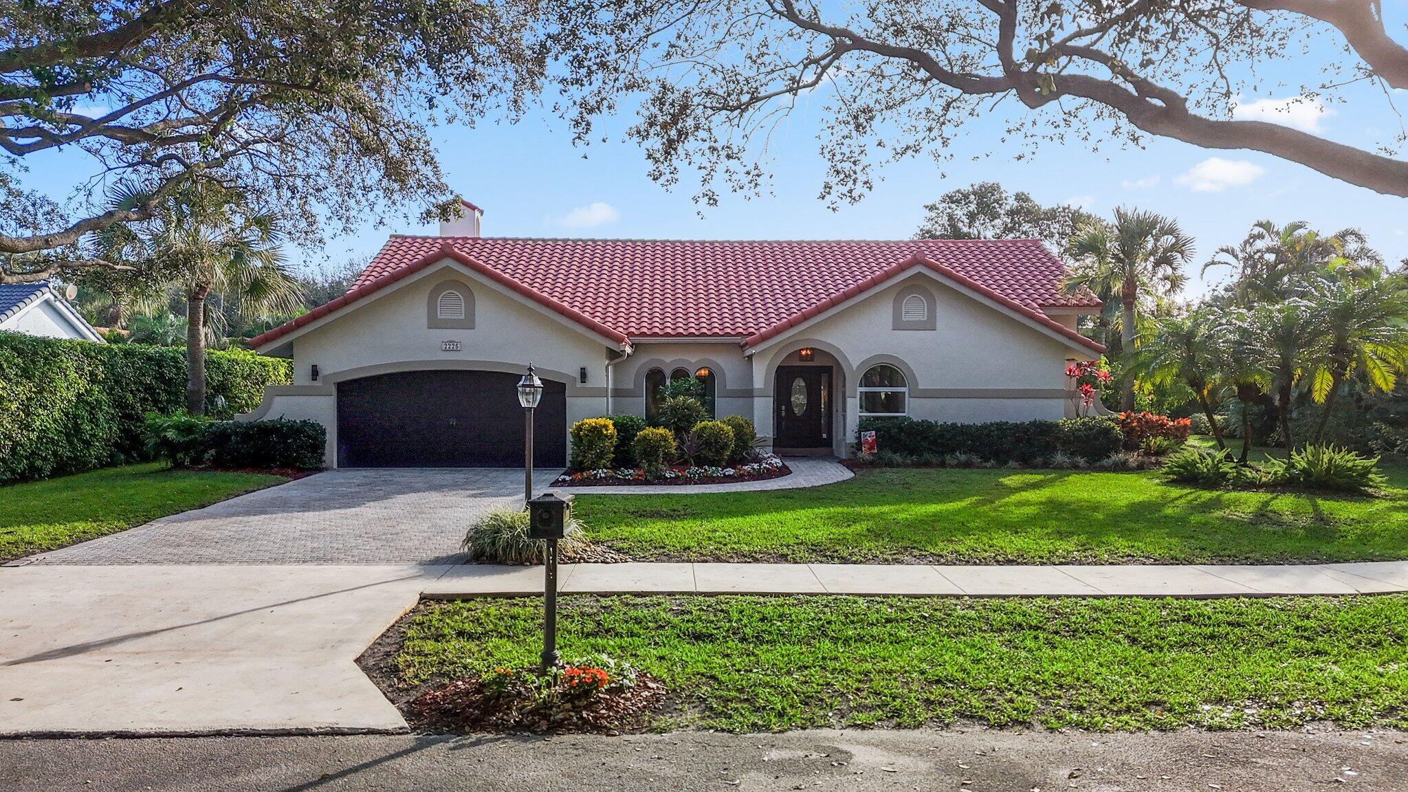 2225 Rabbit Hollowe Circle Delray Beach, FL 33445 - Photo 65 of 65 Exterior Front