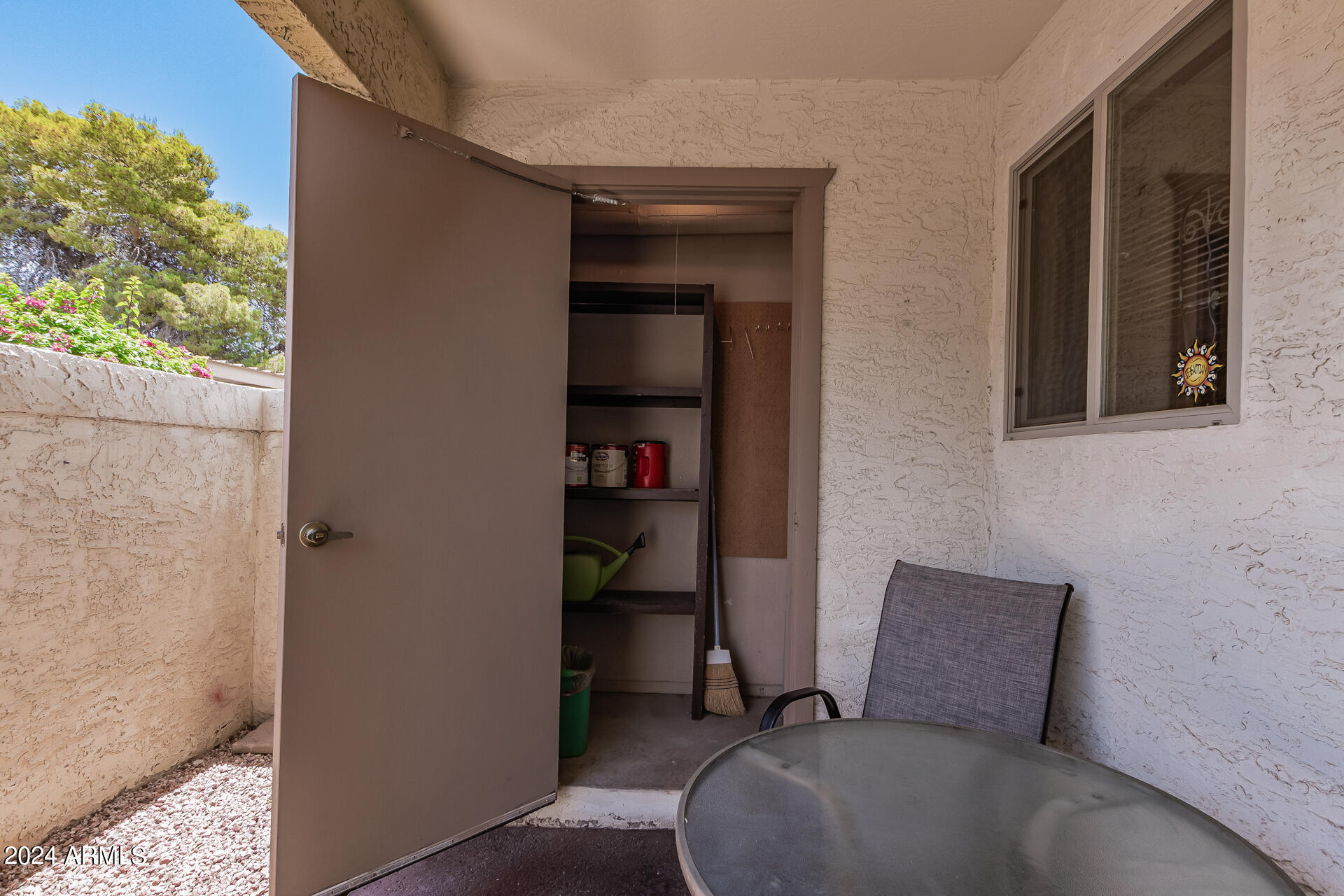 4150 East Cactus Road, Unit 118 Phoenix, AZ 85032 - Photo 3 of 19 Exterior Front Patio Storage
