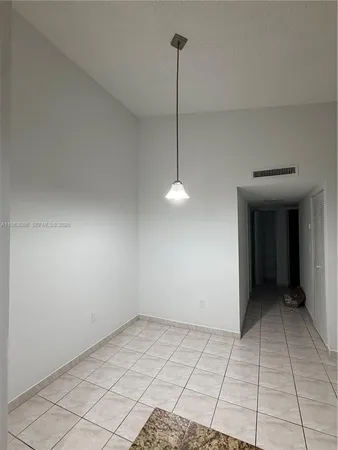 a view of an empty room with window