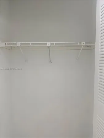 a view of a room with racks on the wall