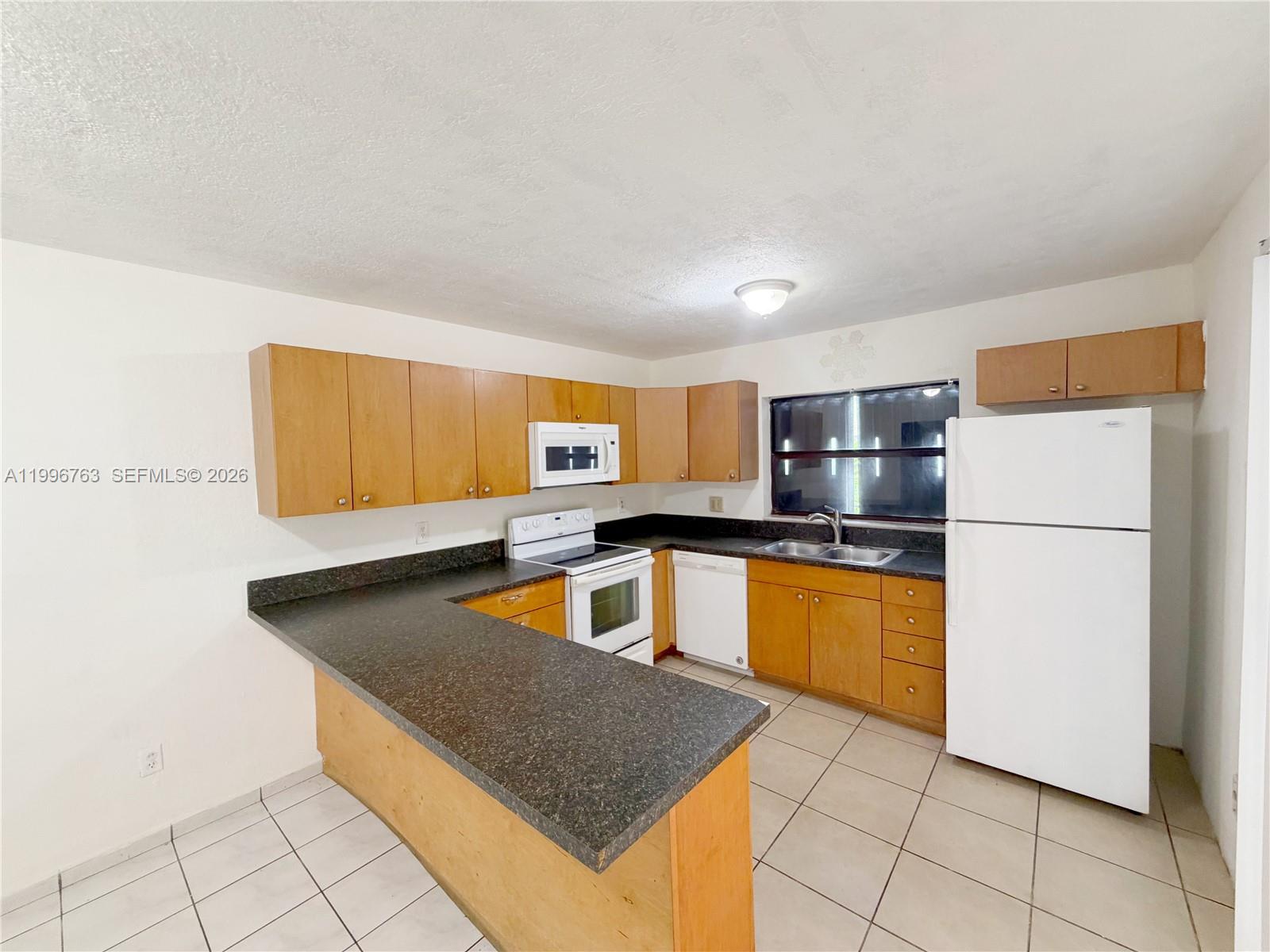 2455 West 67th Place, Unit 1014 Hialeah, FL 33016 - Photo 11 of 19