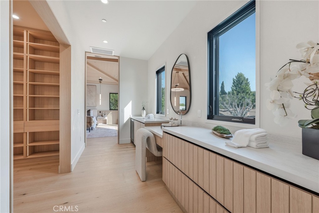 16252 Addison Street Encino, CA 91436 - Photo 15 of 36 a view of a kitchen area with furniture and windows