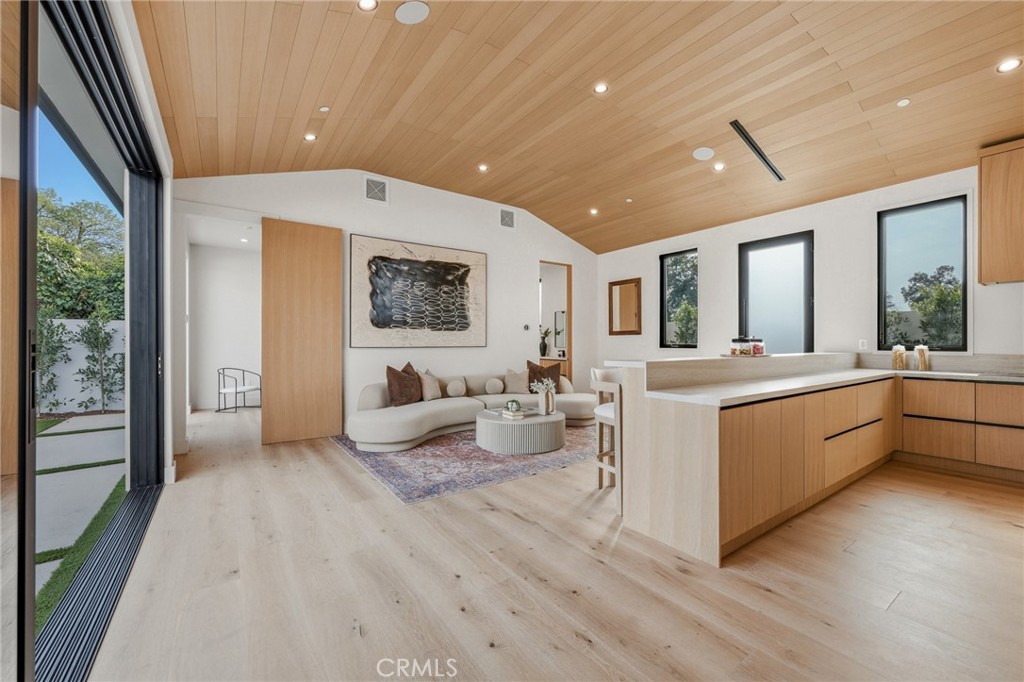 16252 Addison Street Encino, CA 91436 - Photo 32 of 36 a large white room with a large window
