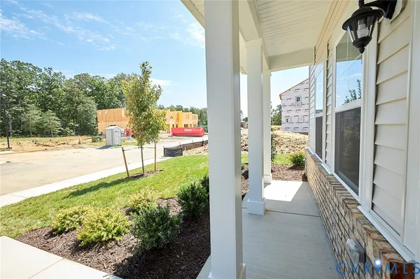 a view of a back yard from a corridor