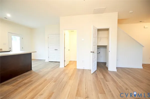 a view of a bathroom with sink and a mirror