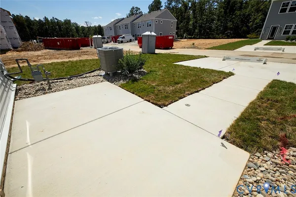 a view of a backyard with sitting area