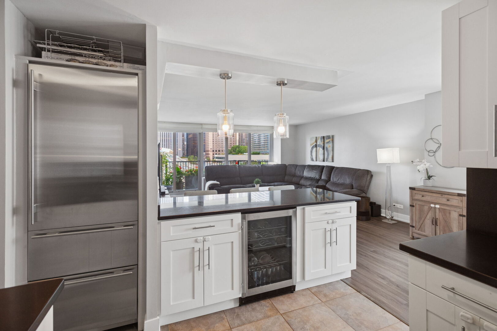 400 East Randolph Street, Unit 930 Chicago, IL 60601 - Photo 6 of 34 a kitchen with a sink stove and refrigerator