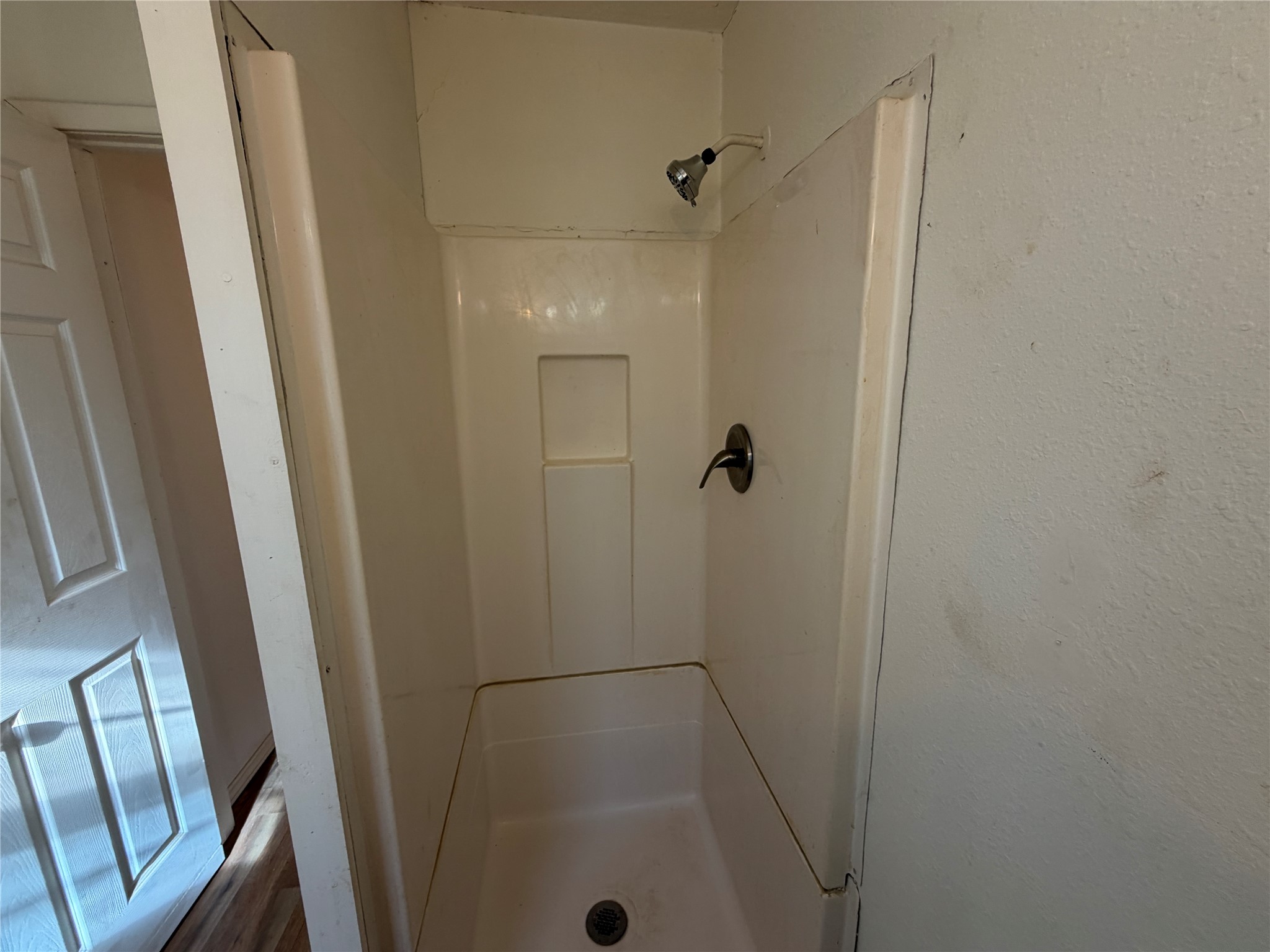 397 County Road 2117 Cleveland, TX 77327 - Photo 20 of 46 a bathroom with a shower