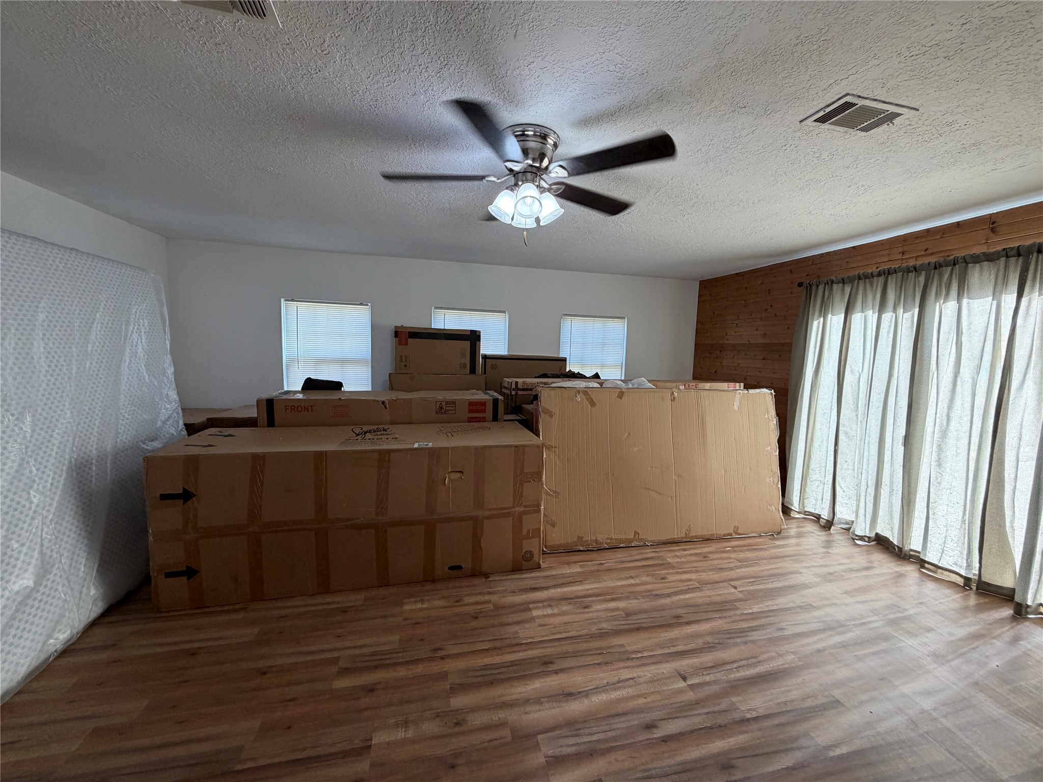 397 County Road 2117 Cleveland, TX 77327 - Photo 23 of 46 a room with furniture and window