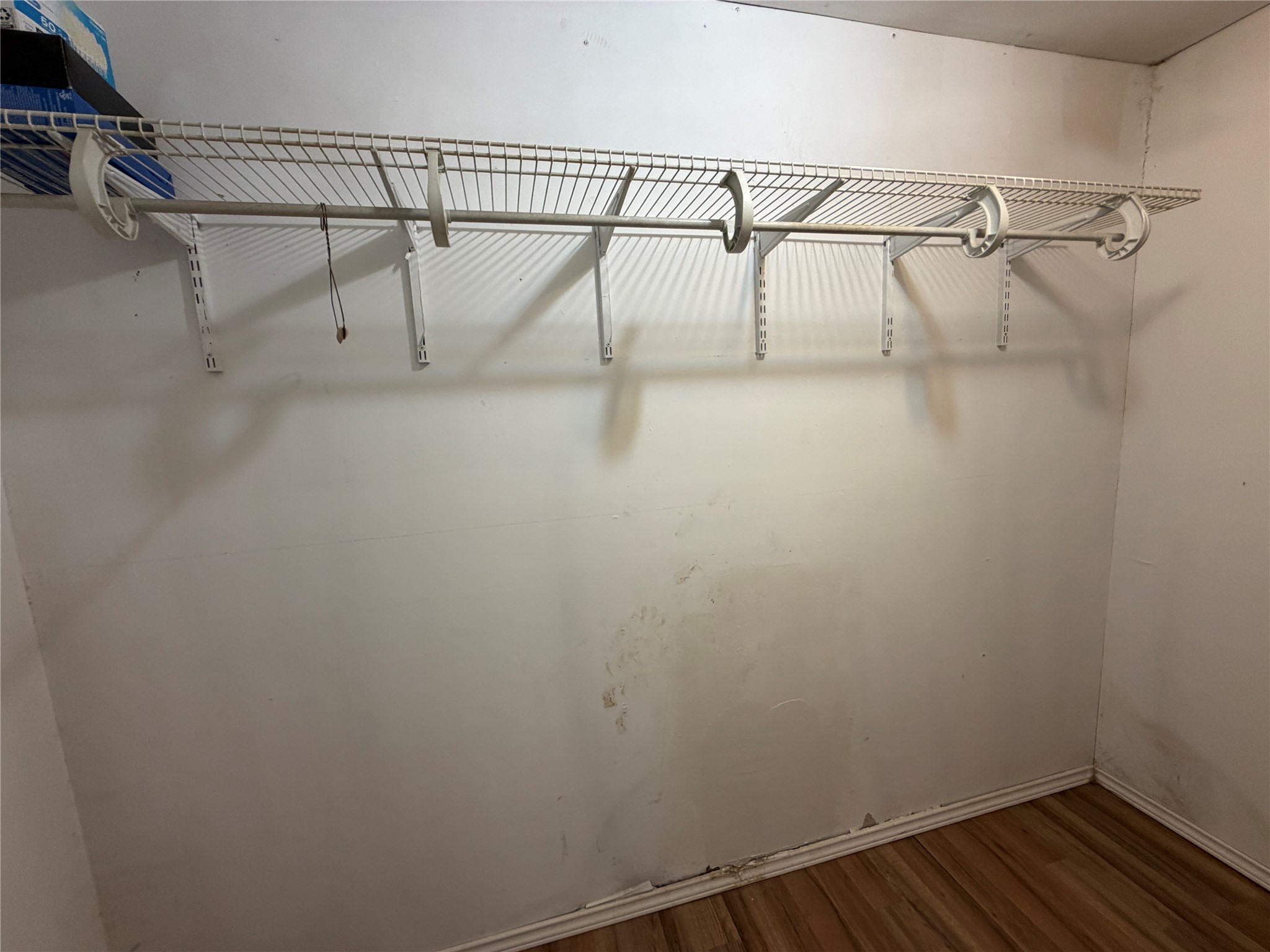 397 County Road 2117 Cleveland, TX 77327 - Photo 28 of 46 a view of a room with racks on the wall