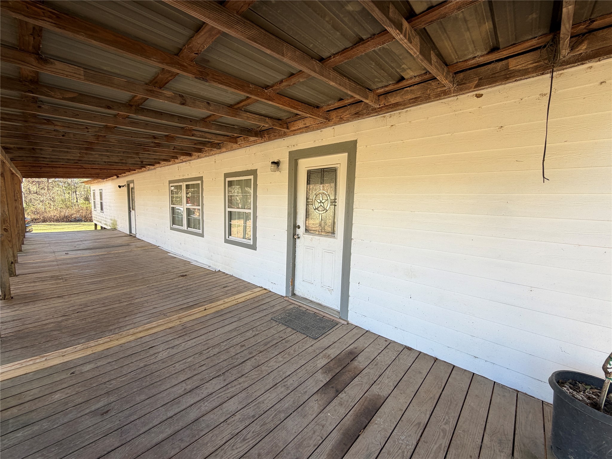 397 County Road 2117 Cleveland, TX 77327 - Photo 35 of 46 a big room with wooden floor