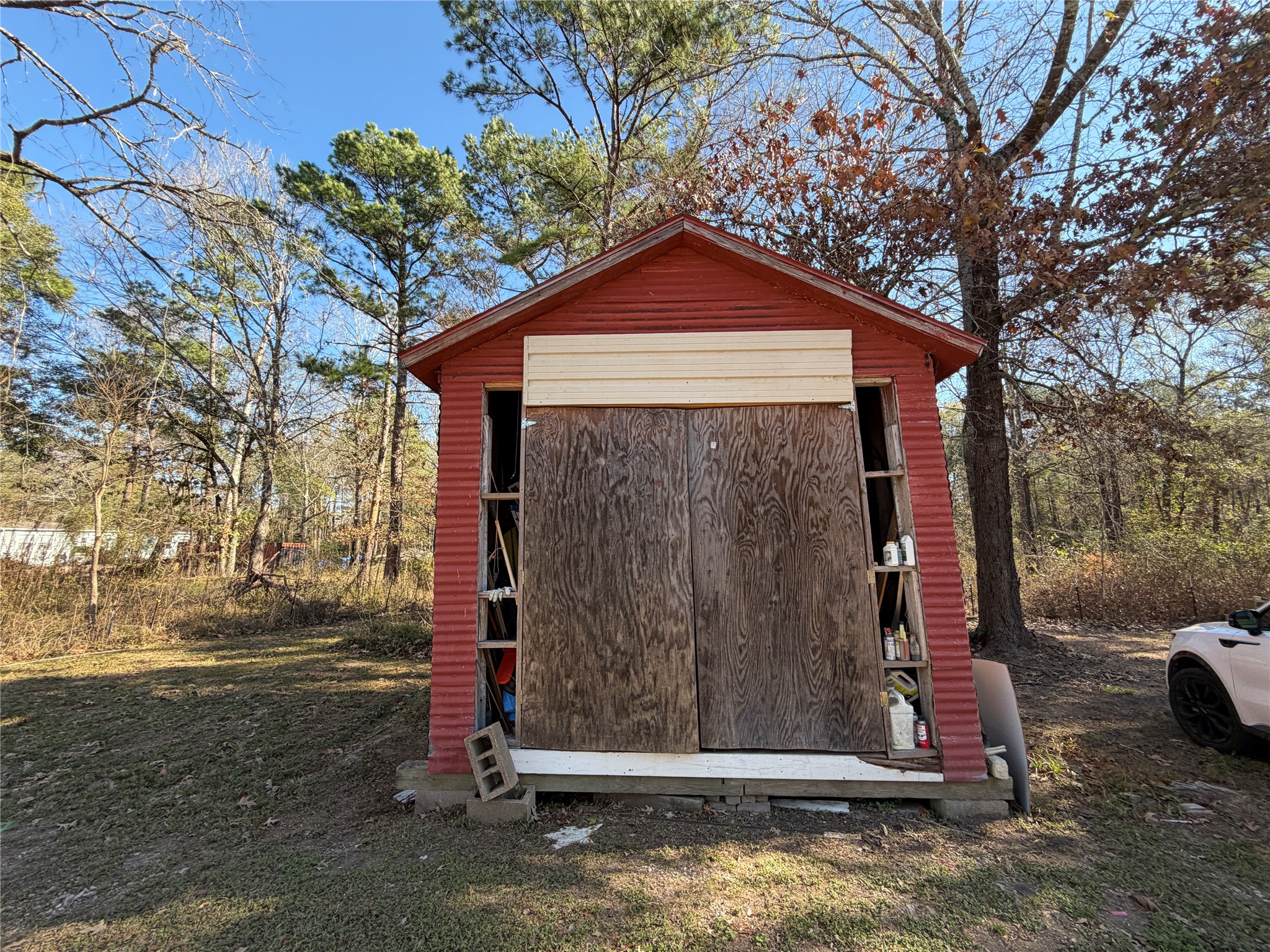 397 County Road 2117 Cleveland, TX 77327 - Photo 42 of 46 a house view with a outdoor space