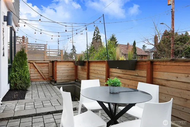 a view of a balcony with chairs