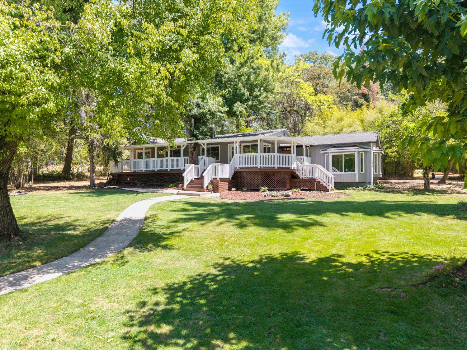 20960 Placer Hills Road Colfax, CA 95713 - Photo 1 of 1 a view of an house with swimming pool and sitting area