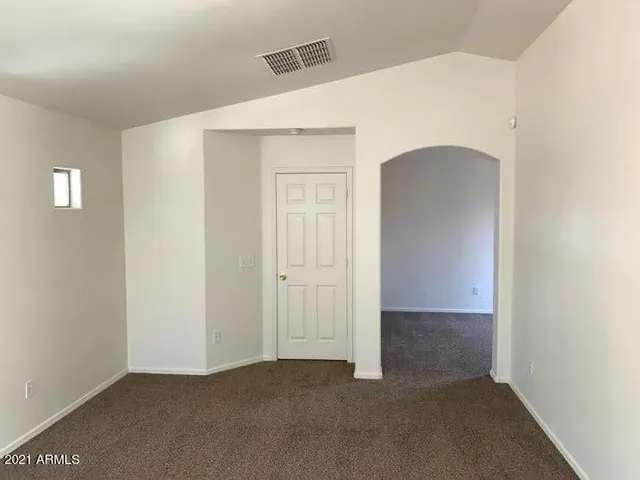 a bathroom with a sink a vanity and a mirror