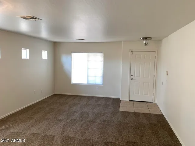 an empty room with a window