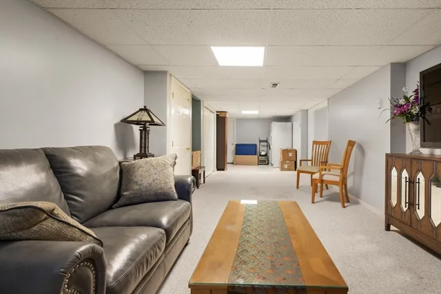 a living room with furniture and a couch