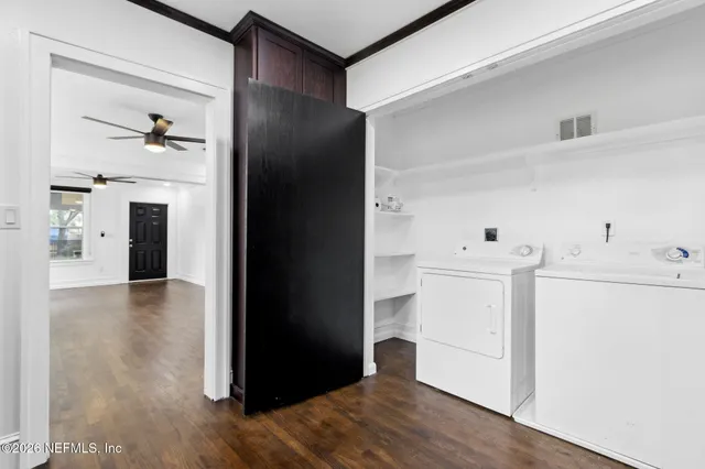 a utility room with dryer and washer