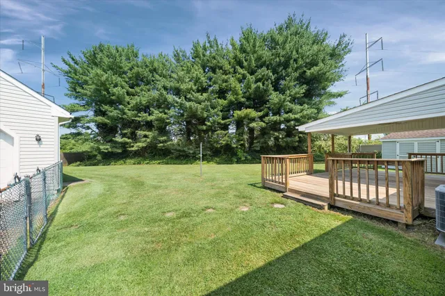 a view of a garden with a bench