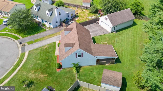 an aerial view of a house with garden