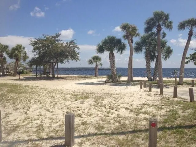 a view of swimming pool with outdoor seating