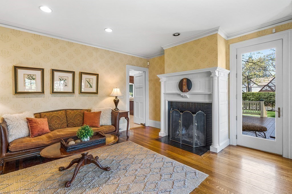 10 Pine Street Winchester, MA 01890 - Photo 16 of 40 a living room with furniture and a fireplace