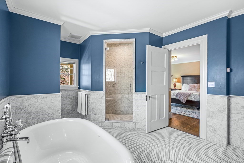 10 Pine Street Winchester, MA 01890 - Photo 24 of 40 a en suite bathroom with a tub shower and bedroom