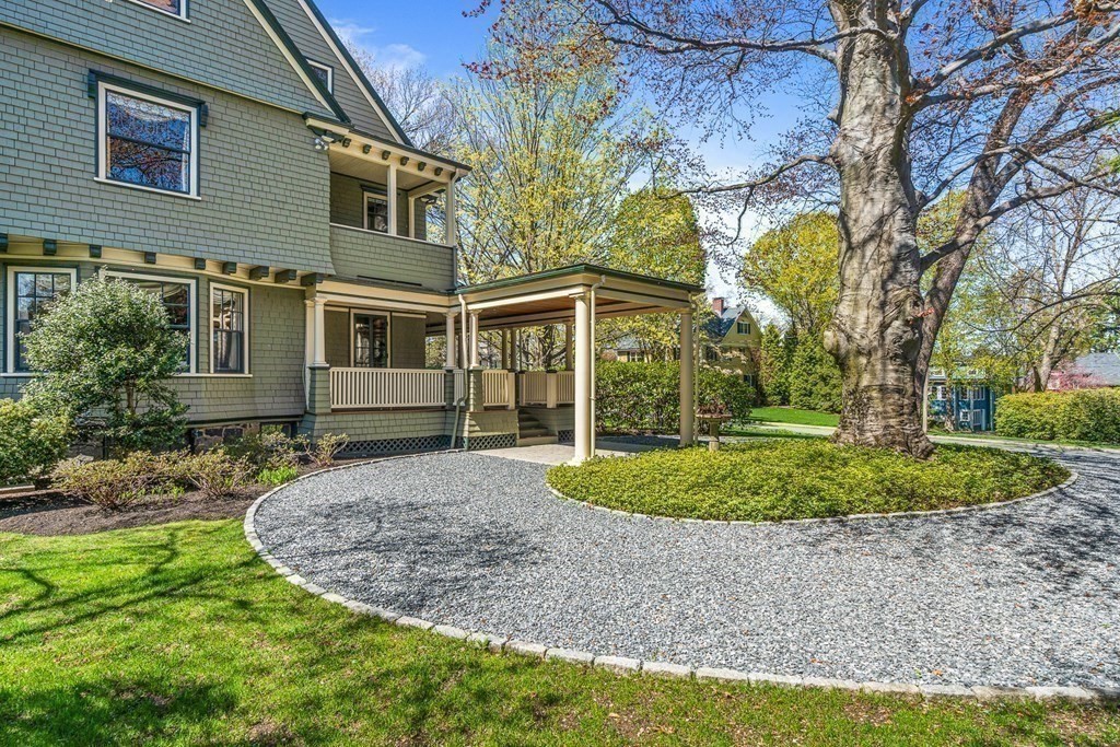 10 Pine Street Winchester, MA 01890 - Photo 35 of 40 a view of a house with a backyard