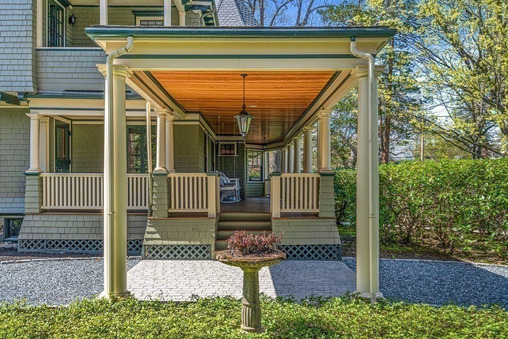 10 Pine Street Winchester, MA 01890 - Photo 36 of 40 a front view of a house with garden