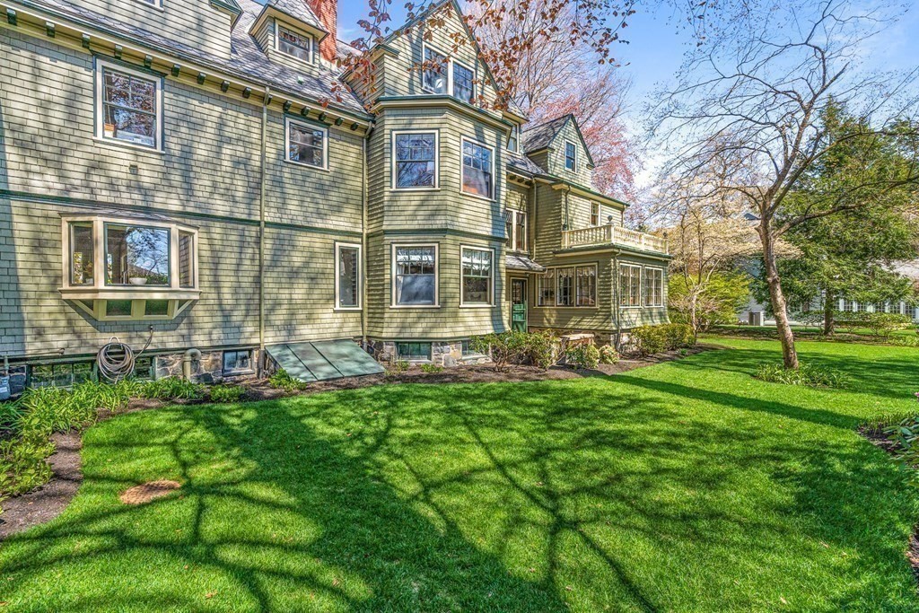 10 Pine Street Winchester, MA 01890 - Photo 38 of 40 a view of a big yard in front of a brick building