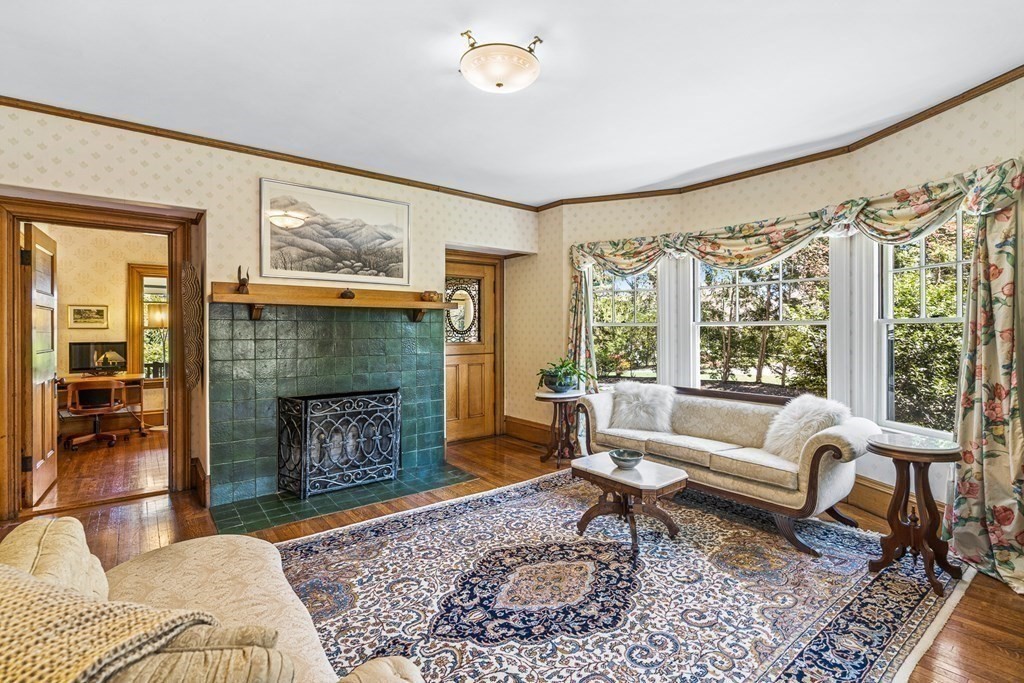 10 Pine Street Winchester, MA 01890 - Photo 7 of 40 a living room with furniture and a fireplace