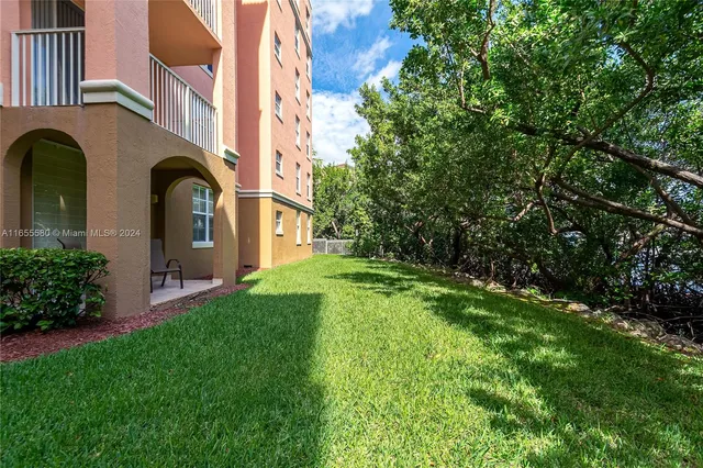 a view of a building with a garden