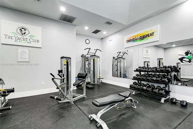 a swimming pool with outdoor seating and yard