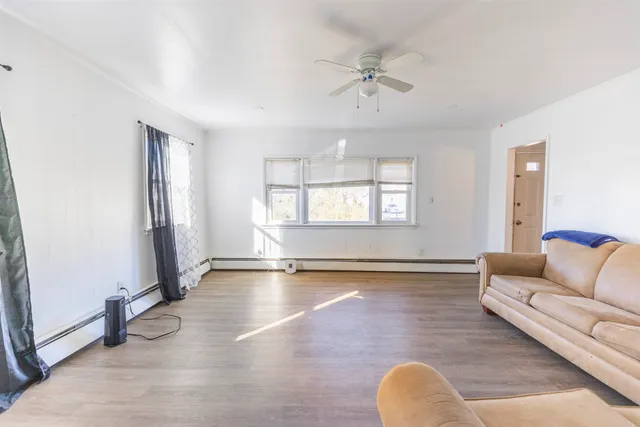 a view of livingroom with hardwood floor and window