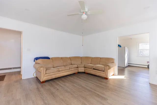 a living room with furniture and a couch