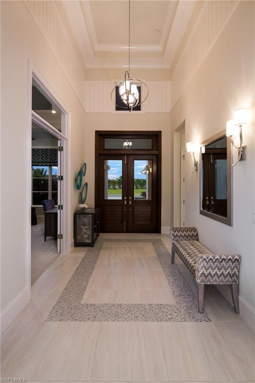 6818 Mangrove Avenue Naples, FL 34109 - Photo 5 of 24 a view of an entryway with a livingroom