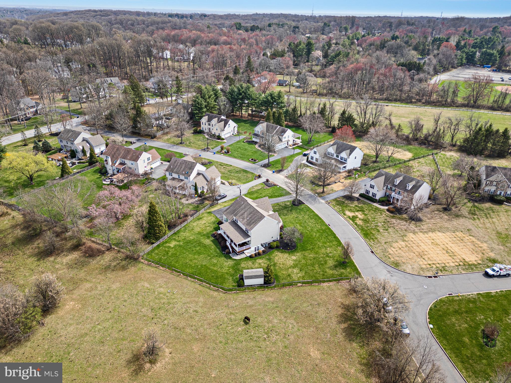 26 Woodside Farm Road Garnet Valley, PA 19060 - Photo 11 of 57 an aerial view of residential houses with outdoor space
