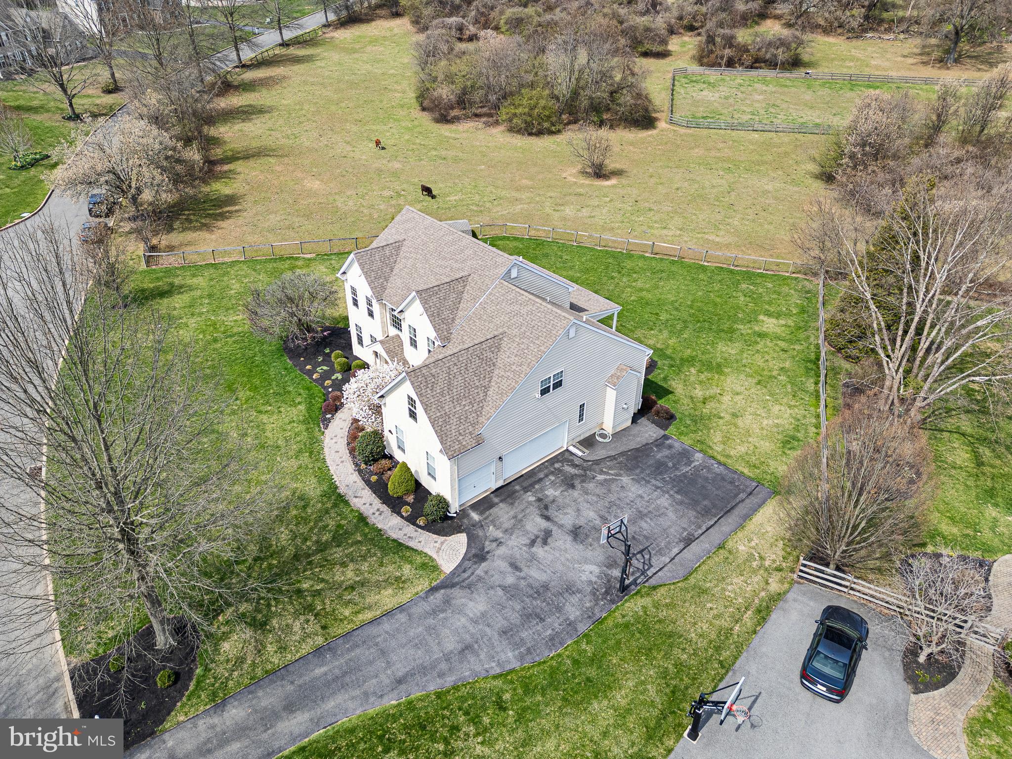 26 Woodside Farm Road Garnet Valley, PA 19060 - Photo 14 of 57 an aerial view of a house with outdoor space
