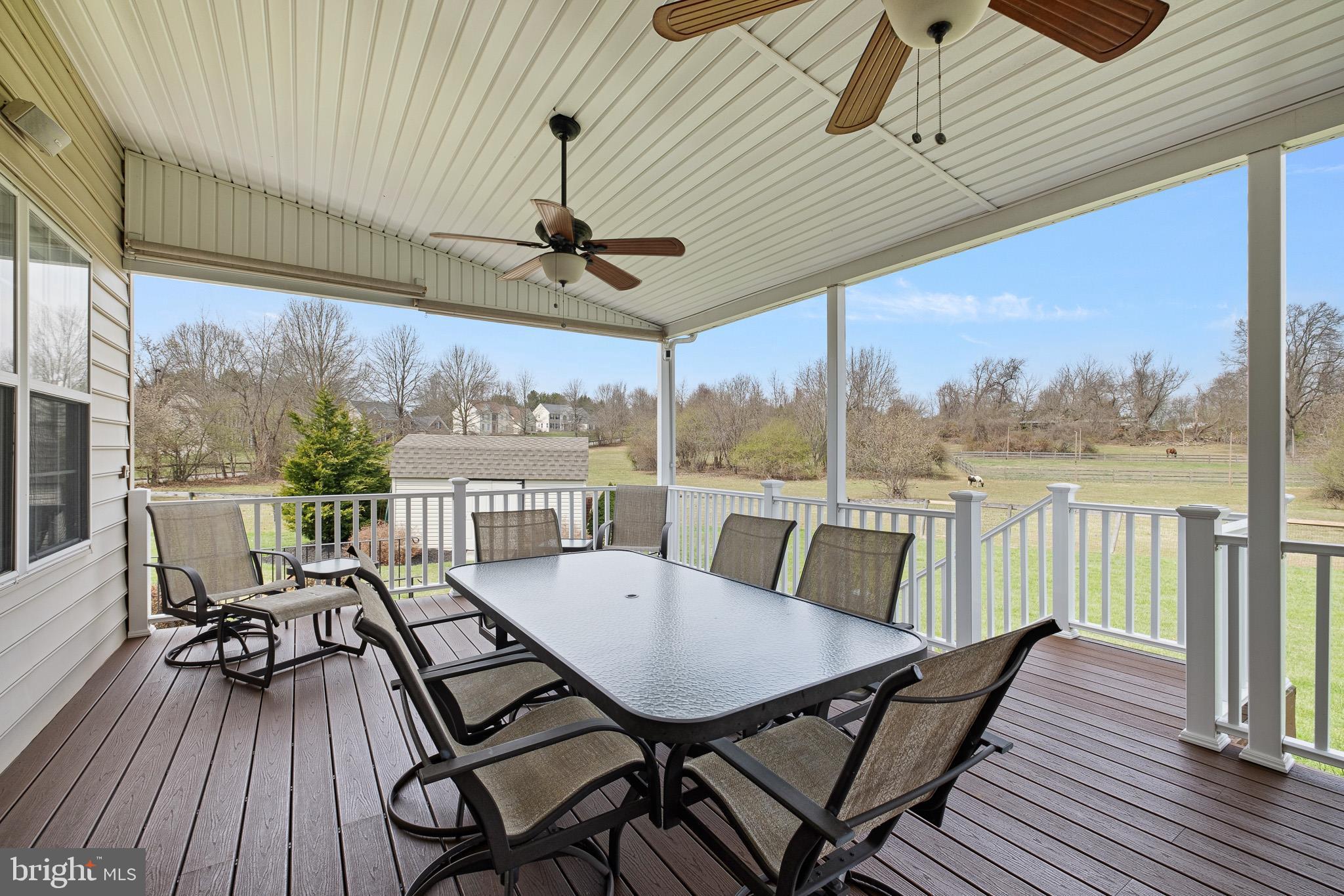 26 Woodside Farm Road Garnet Valley, PA 19060 - Photo 20 of 57 a view of a balcony with furniture and wooden floor