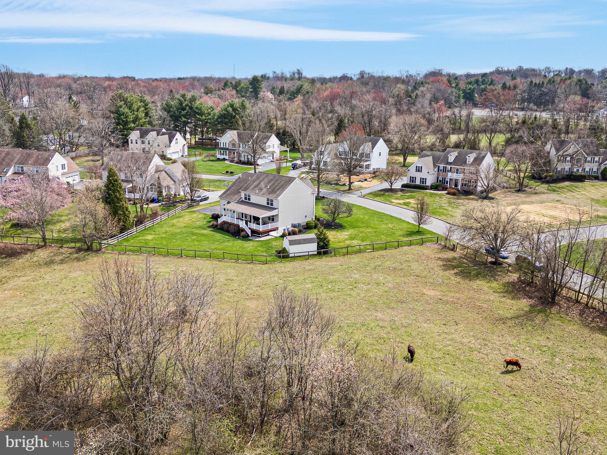 26 Woodside Farm Road Garnet Valley, PA 19060 - Photo 2 of 57 a view of a swimming pool with a yard and mountain view