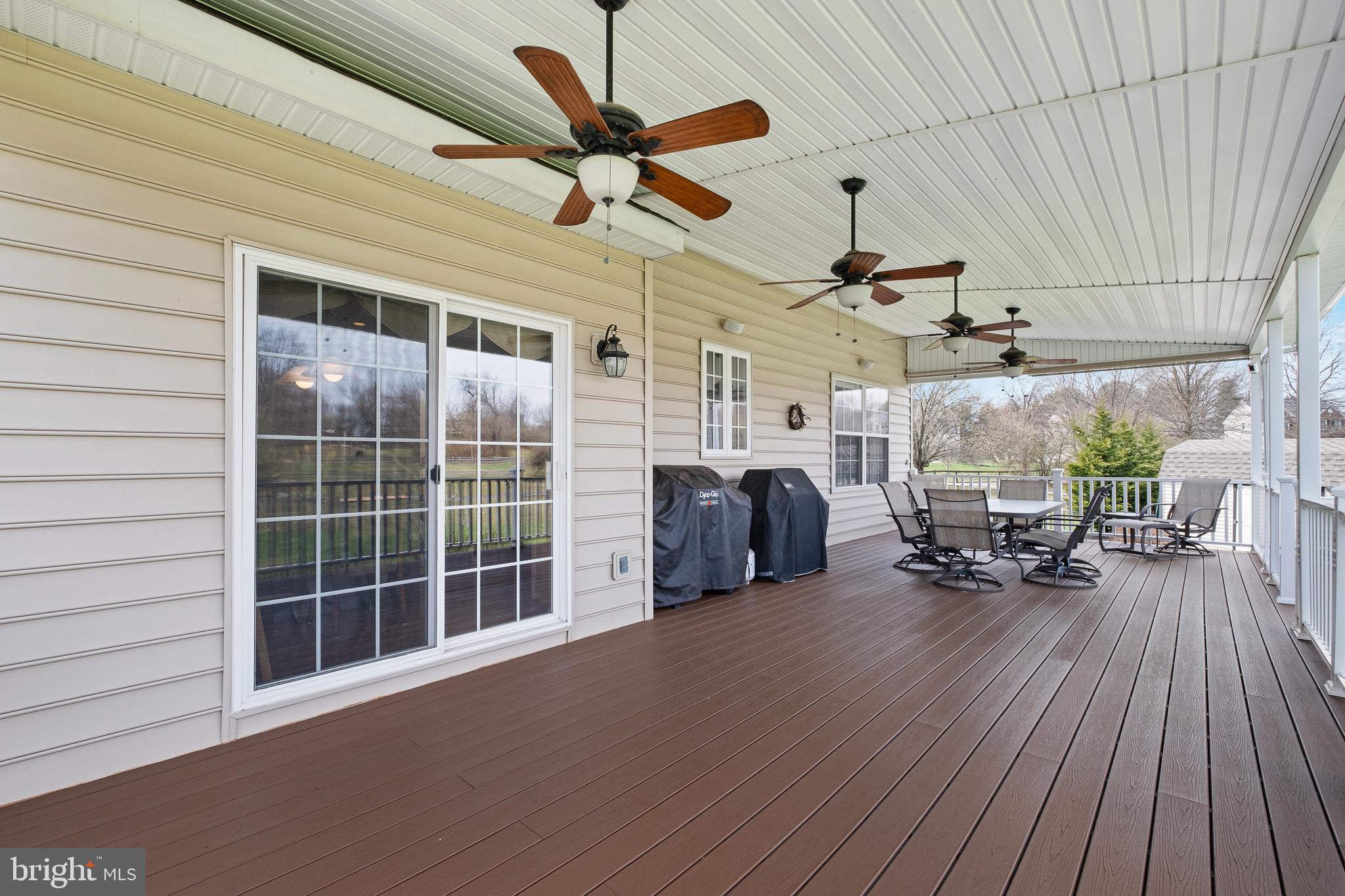 26 Woodside Farm Road Garnet Valley, PA 19060 - Photo 21 of 57 a view of a livingroom with furniture and a ceiling fan