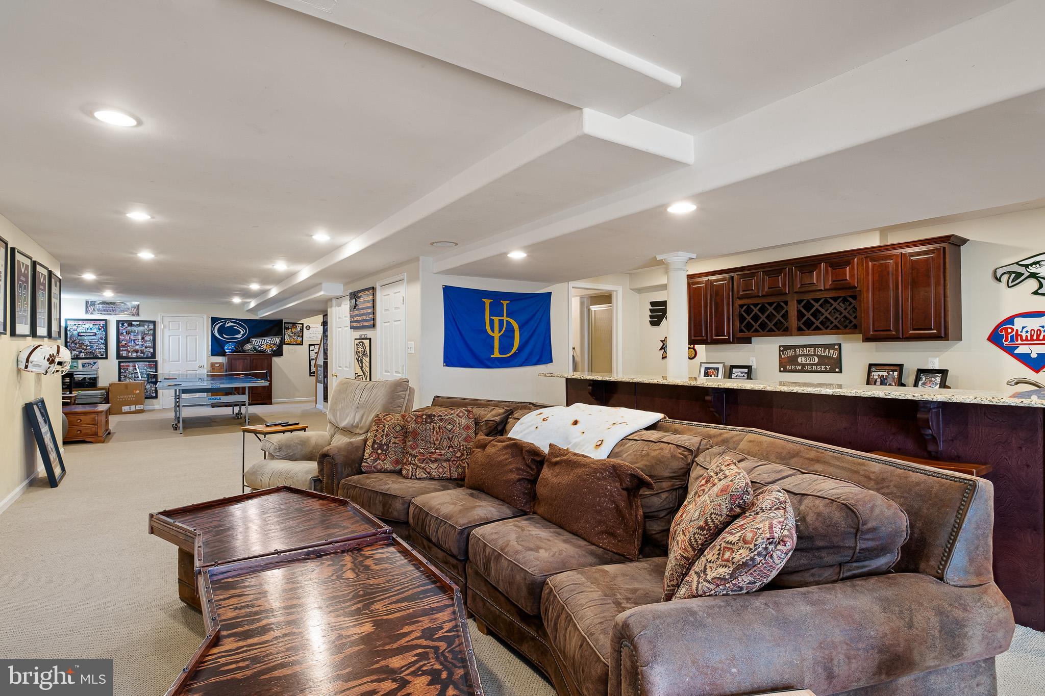 26 Woodside Farm Road Garnet Valley, PA 19060 - Photo 26 of 57 a living room with furniture and a flat screen tv