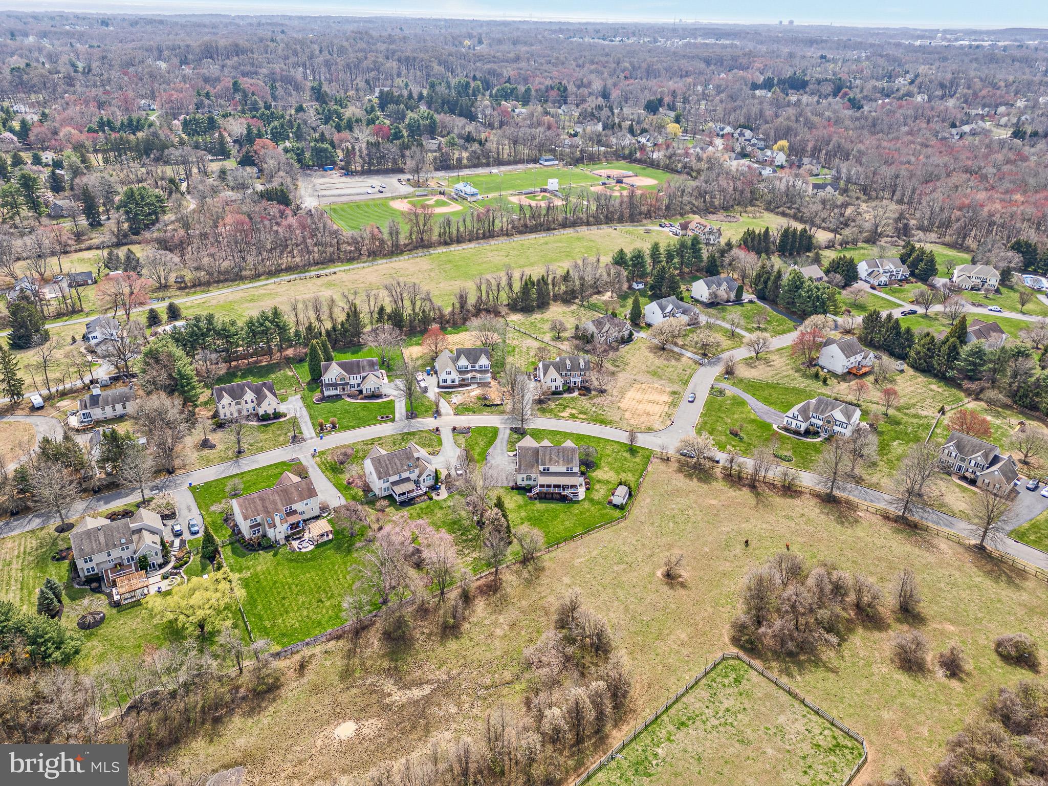 26 Woodside Farm Road Garnet Valley, PA 19060 - Photo 3 of 57 an aerial view of residential houses with outdoor space