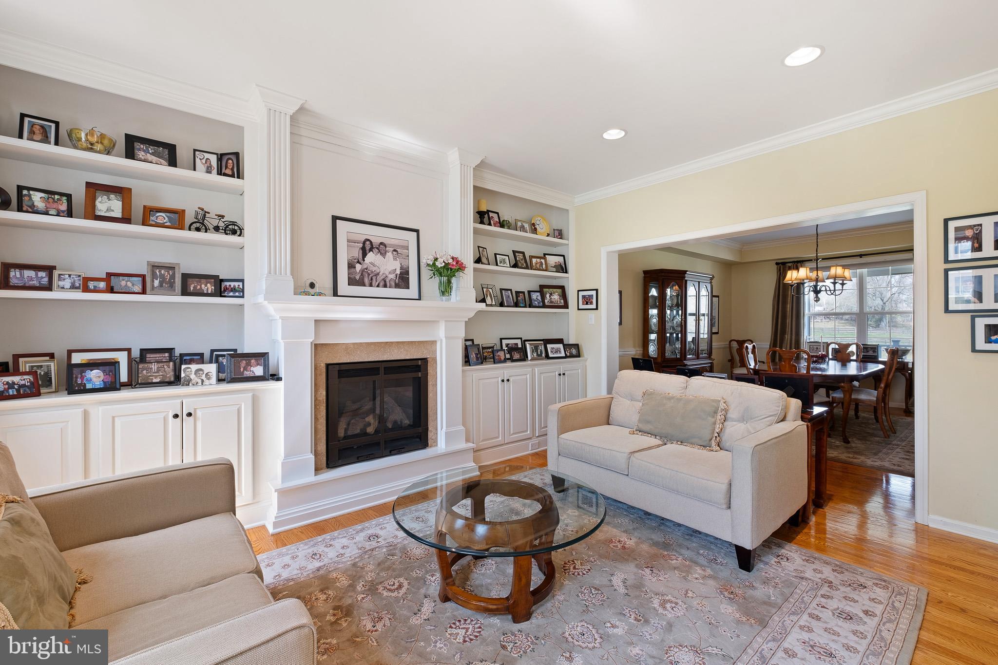 26 Woodside Farm Road Garnet Valley, PA 19060 - Photo 31 of 57 a living room with furniture and a fireplace